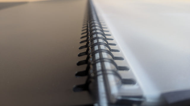 close up of the spiral bound spine of the mapac professional presenter
